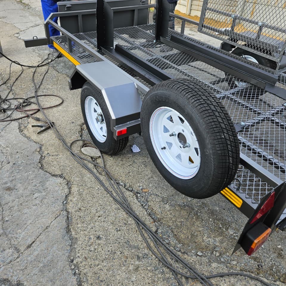 Finishing two new steel trailers
